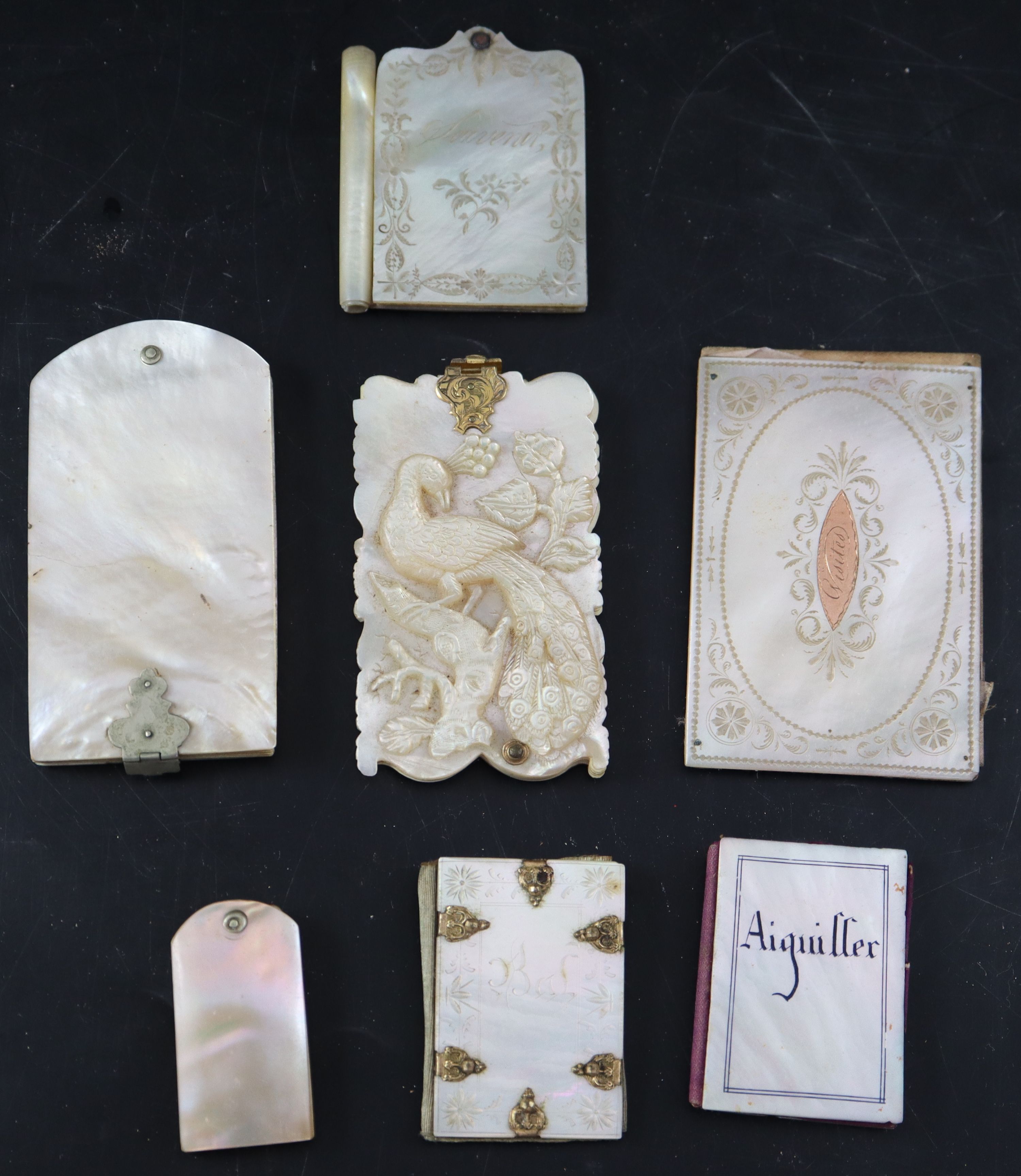 A collection of 19th century Palais Royale mother of pearl note cases and dance cards, largest 9cm (7)
